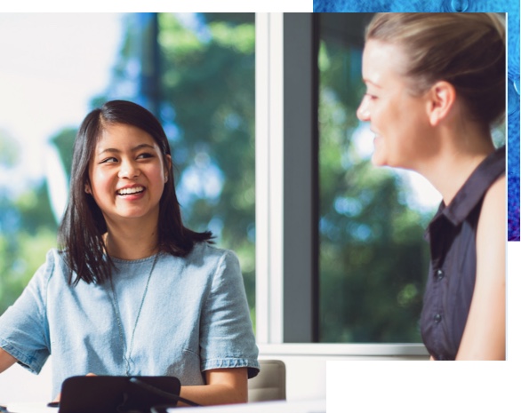 student an staff member talking