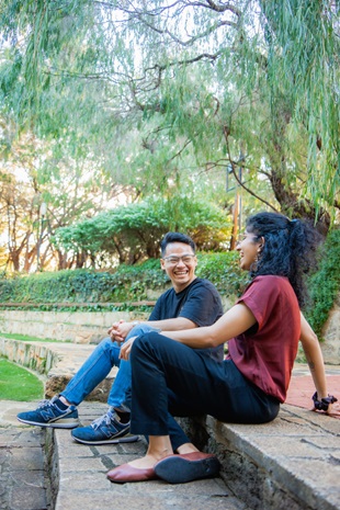 Two students sitting at UWA Campus